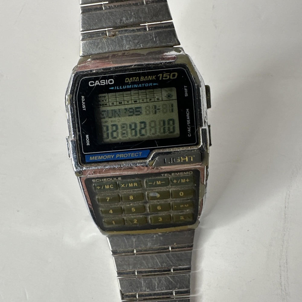 Vintage Casio Data Bank 150 DBC-1500 Men Digital Calculator Watch Silver